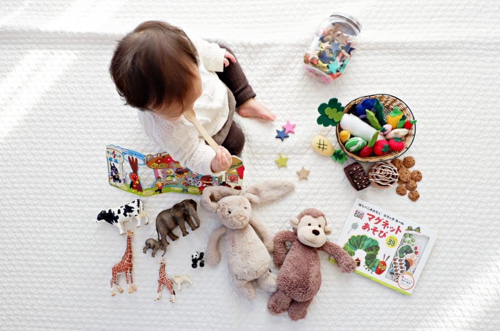 Kid playing with toys - Child photography tips and ideas