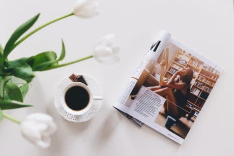 Magazine with plant and cup - What is Editorial Photography