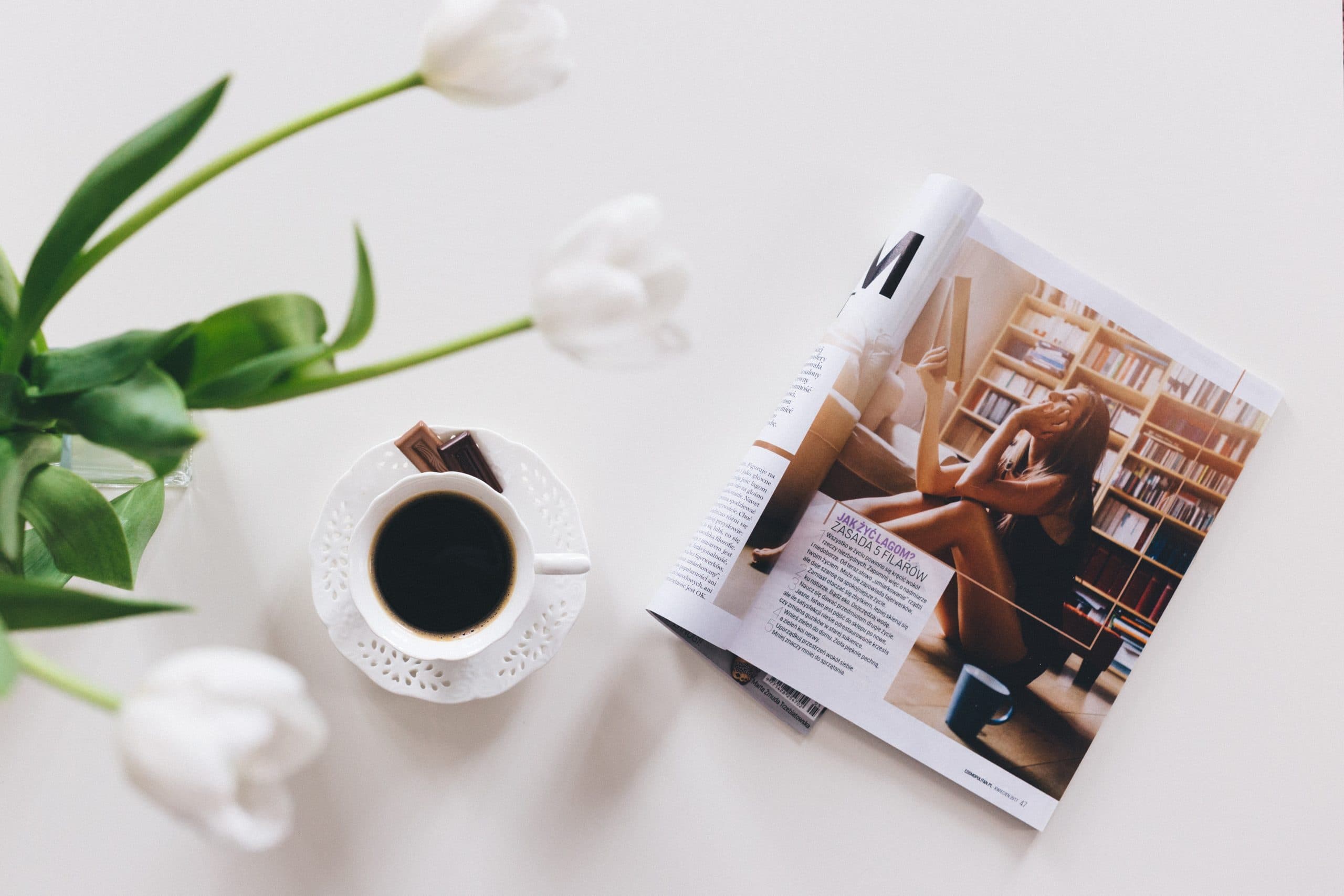 Magazine with plant and cup - What is Editorial Photography