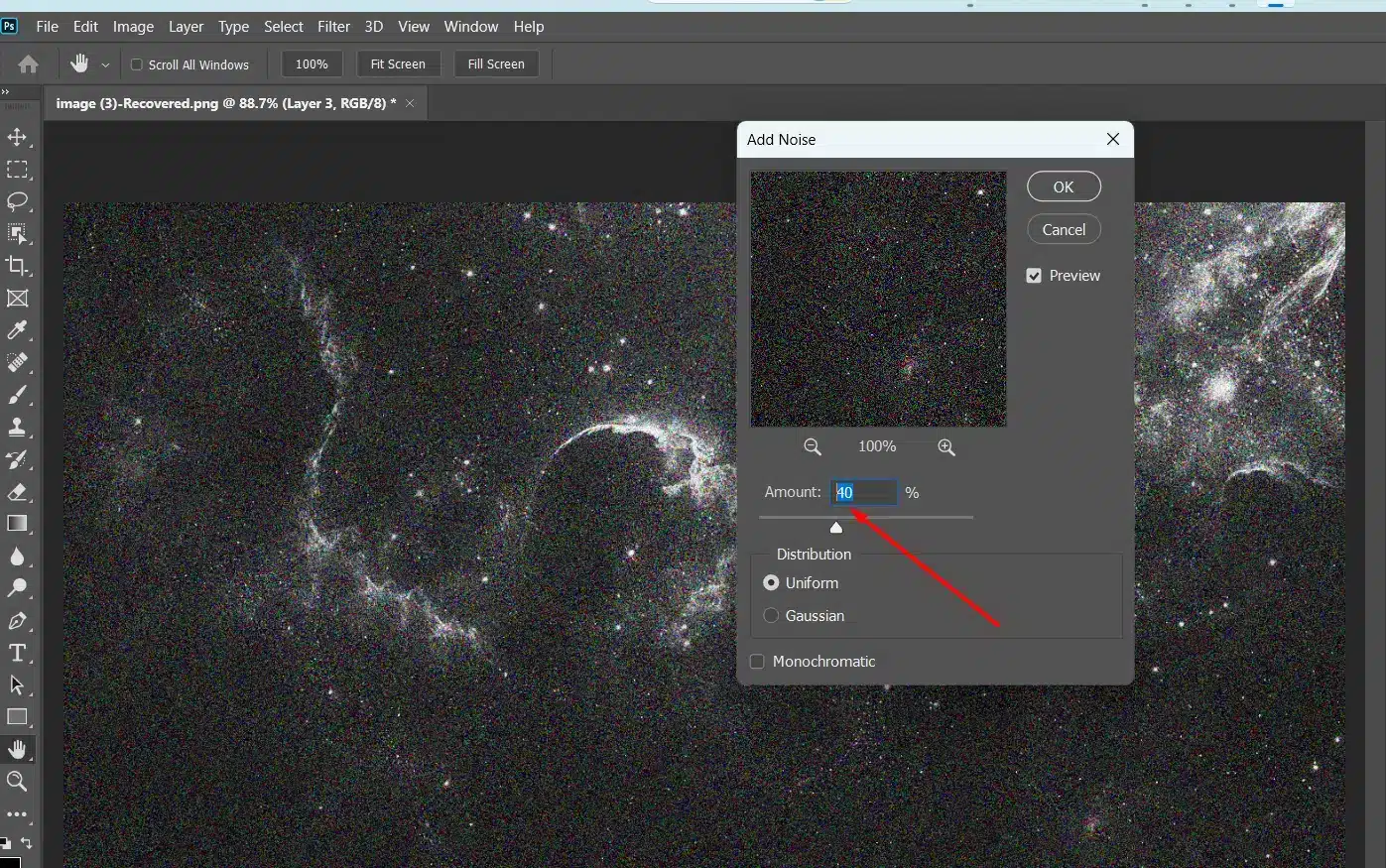 Close-up view of Photoshop's "Add Noise" filter settings with the amount set to 40%. The noise effect adds stars to a black night sky.