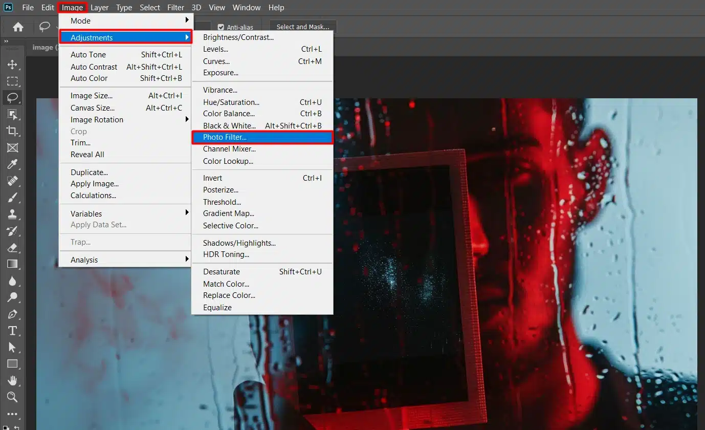 Photoshop interface with 'Photo Filter' option highlighted under the 'Image' menu, photo of a person behind a wet window.
