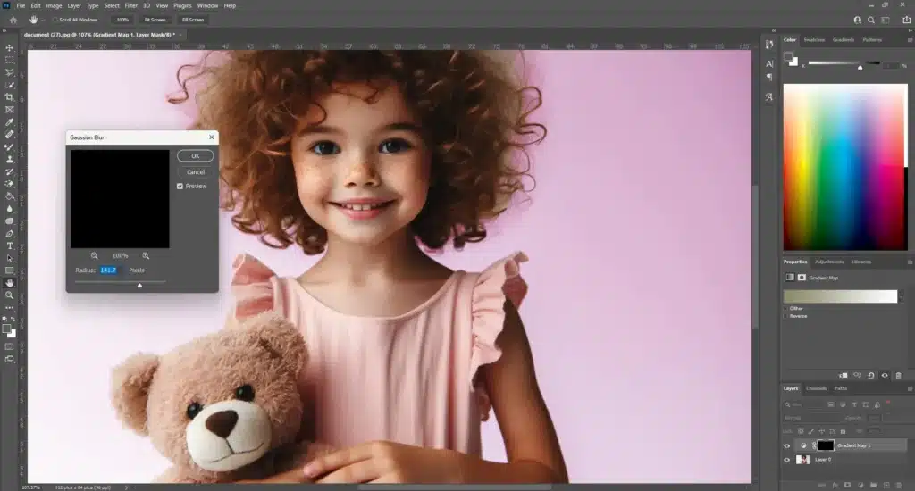 Young girl with a teddy bear and a light pink background in Photoshop, with the Gaussian Blur tool applied to create a soft texture effect.