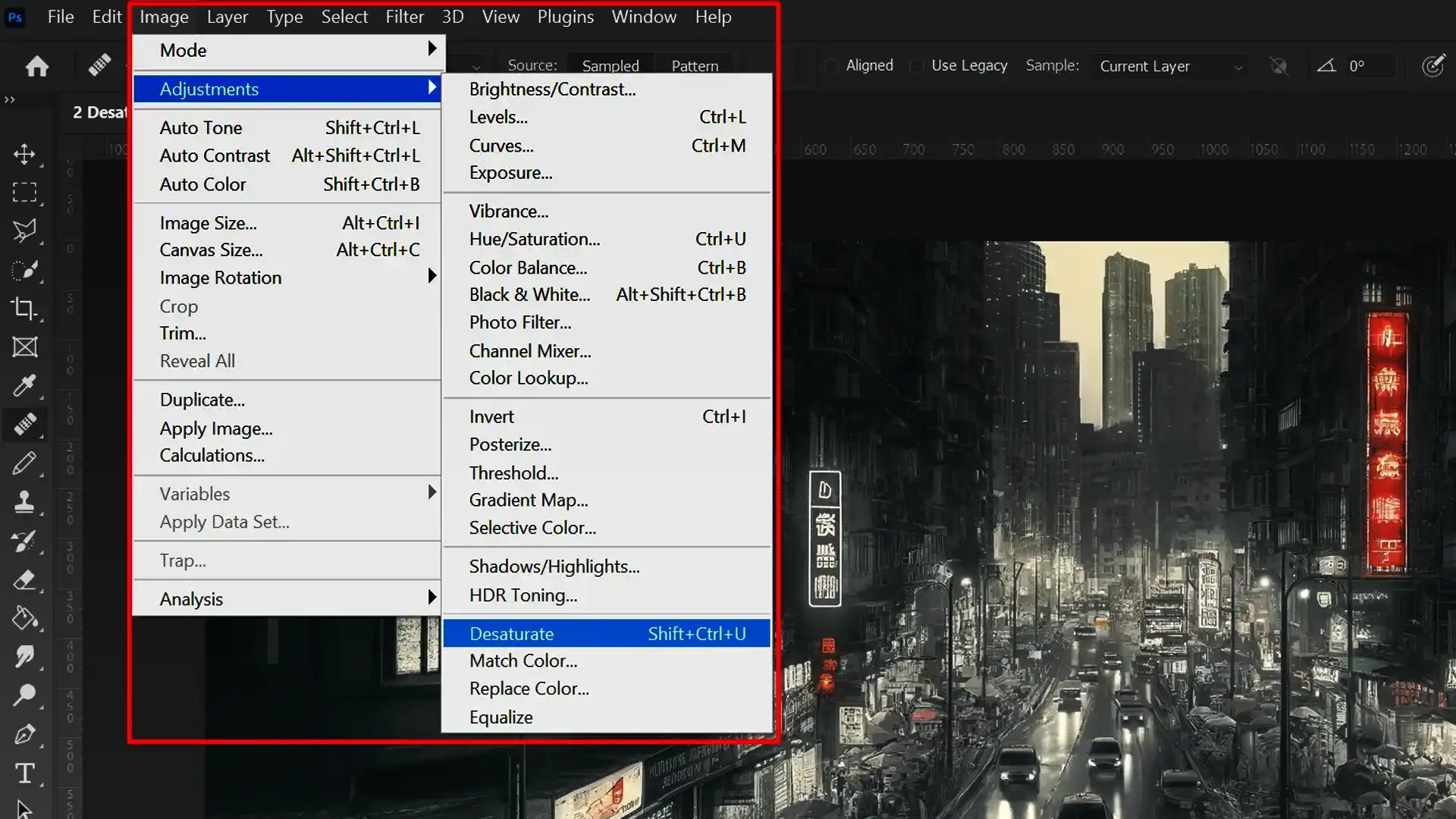 Screenshot of Photoshop interface with an image being desaturated to black and white using the Desaturate function.