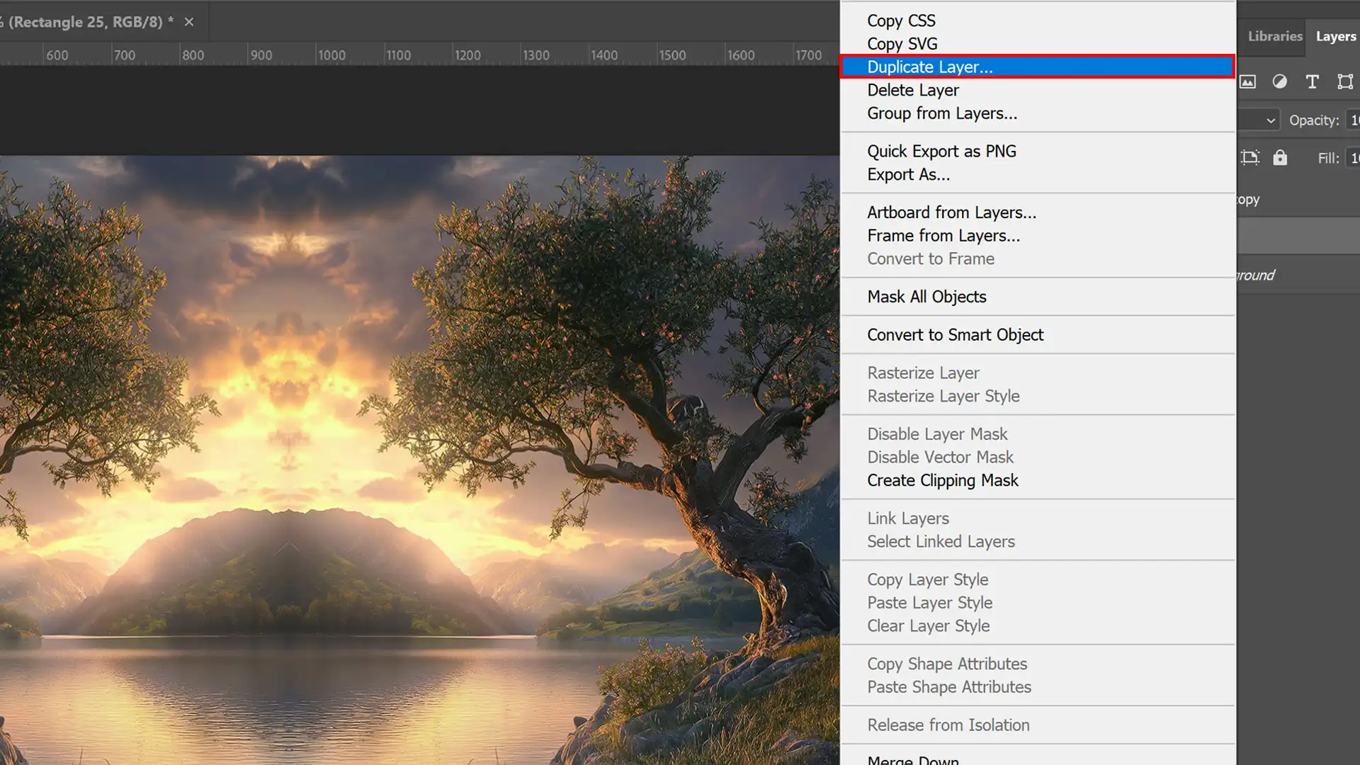 Screenshot in Photoshop showing the process of duplicating a layer to create a mirror effect on a landscape image.