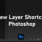 Photoshop New layer shortcut highlighted with a red arrow