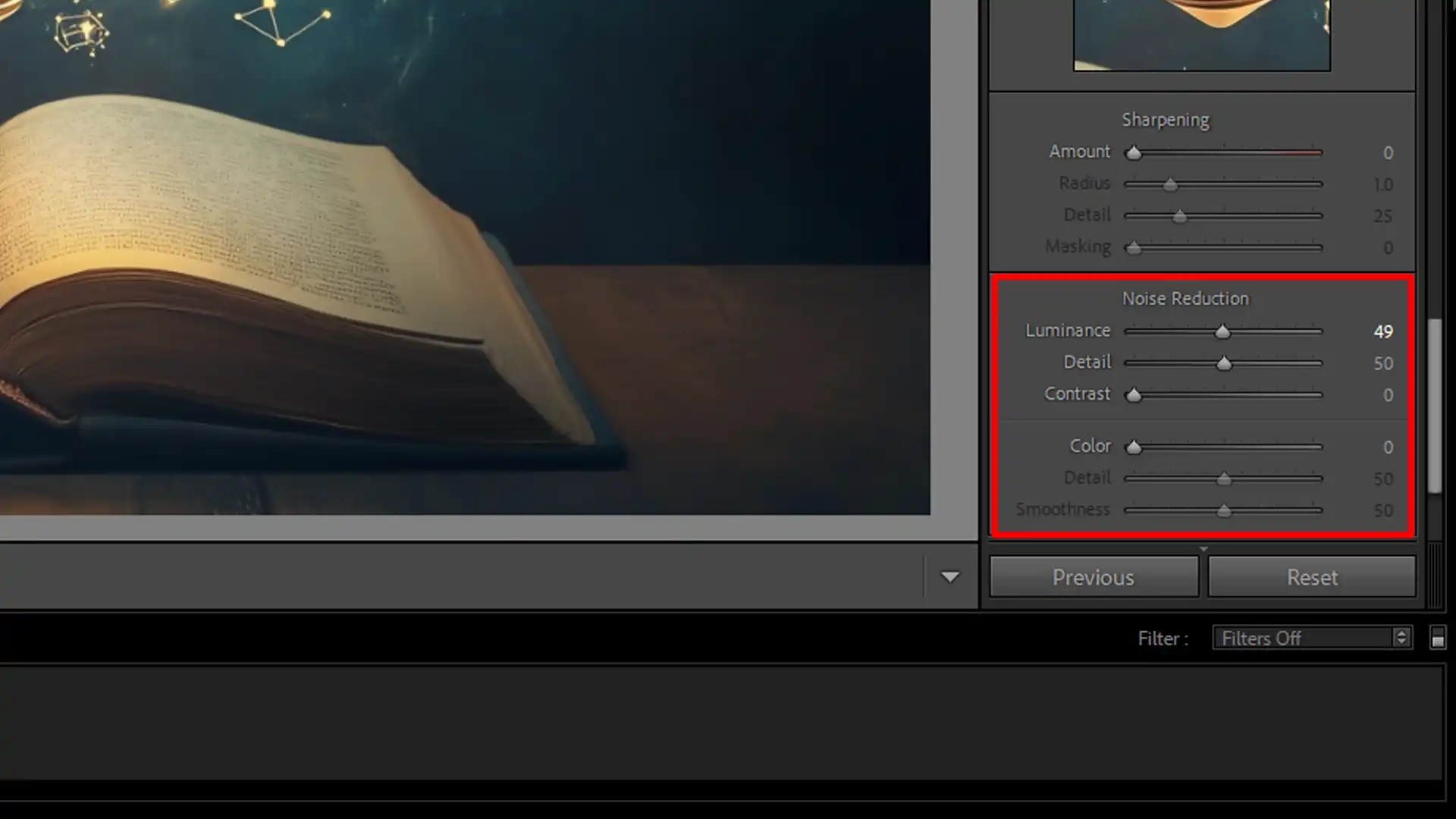 Adjusting Luminance Noise settings in Lightroom to reduce digital noise on an image of an open book.