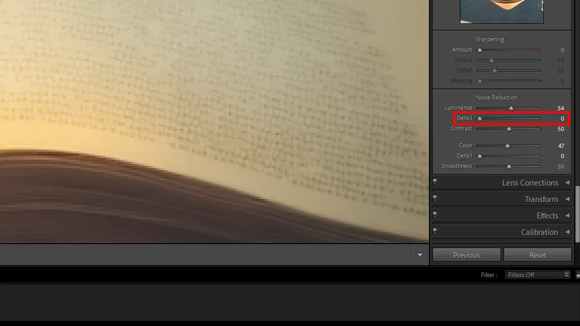 Using the Detail slider in Lightroom to recover texture after applying noise reduction.