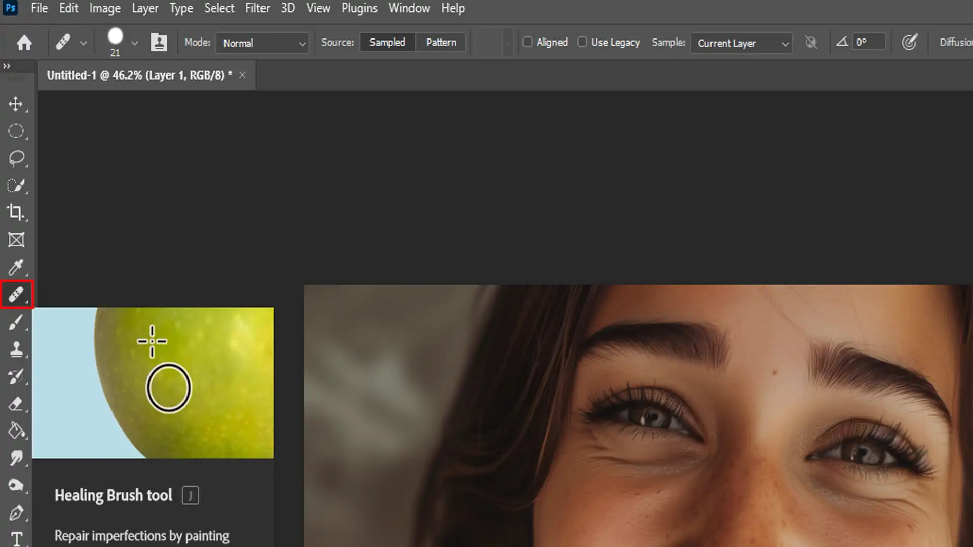 Using the Healing Brush tool in Photoshop to remove blemishes.