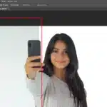 Photoshop interface showing the selection of the background using the rectangular marquee tool around a person taking a selfie.