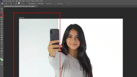 Photoshop interface showing the selection of the background using the rectangular marquee tool around a person taking a selfie.