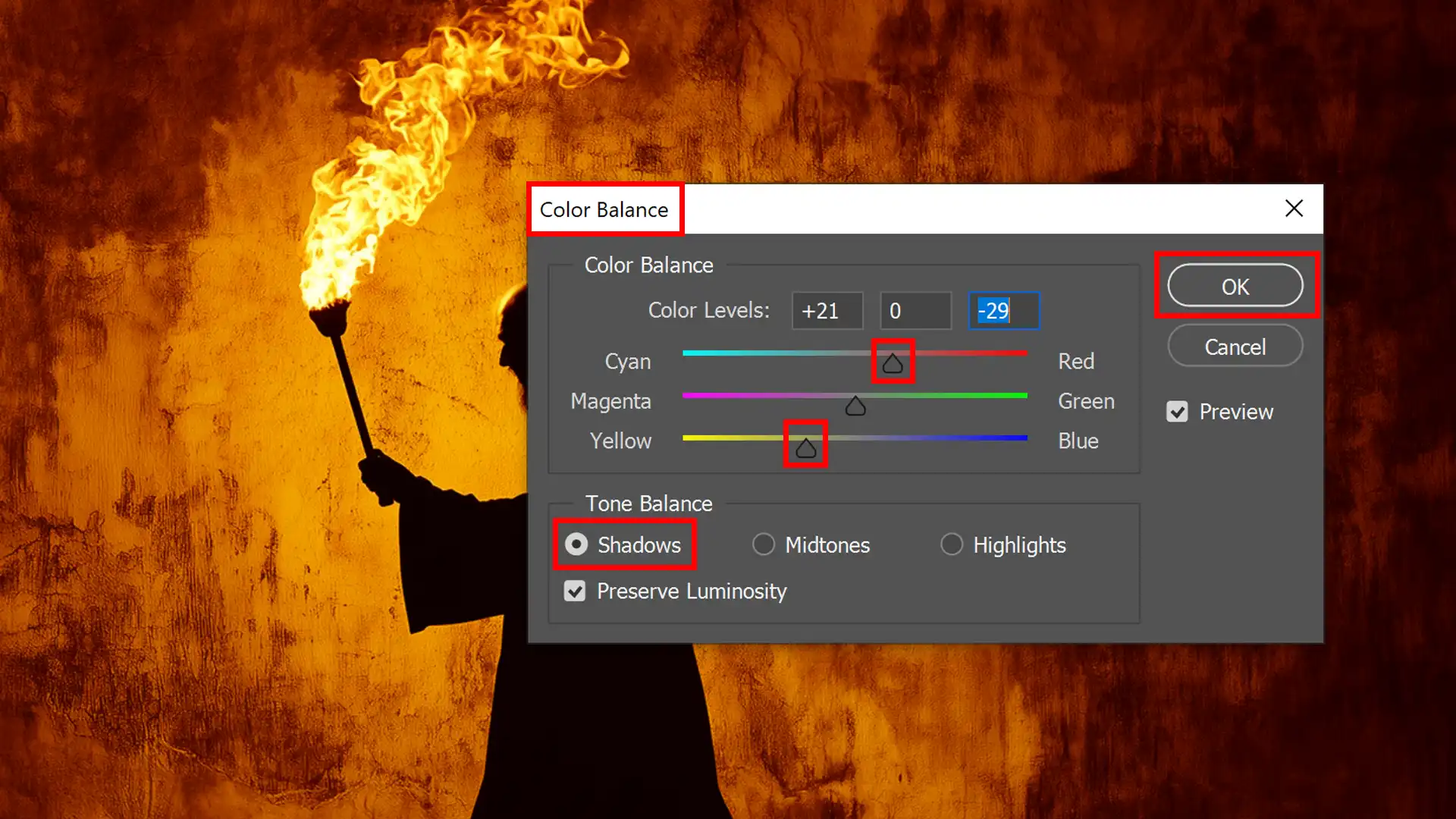 Photoshop Color Balance settings for adjusting shadows and highlights to create warmer fire tones.