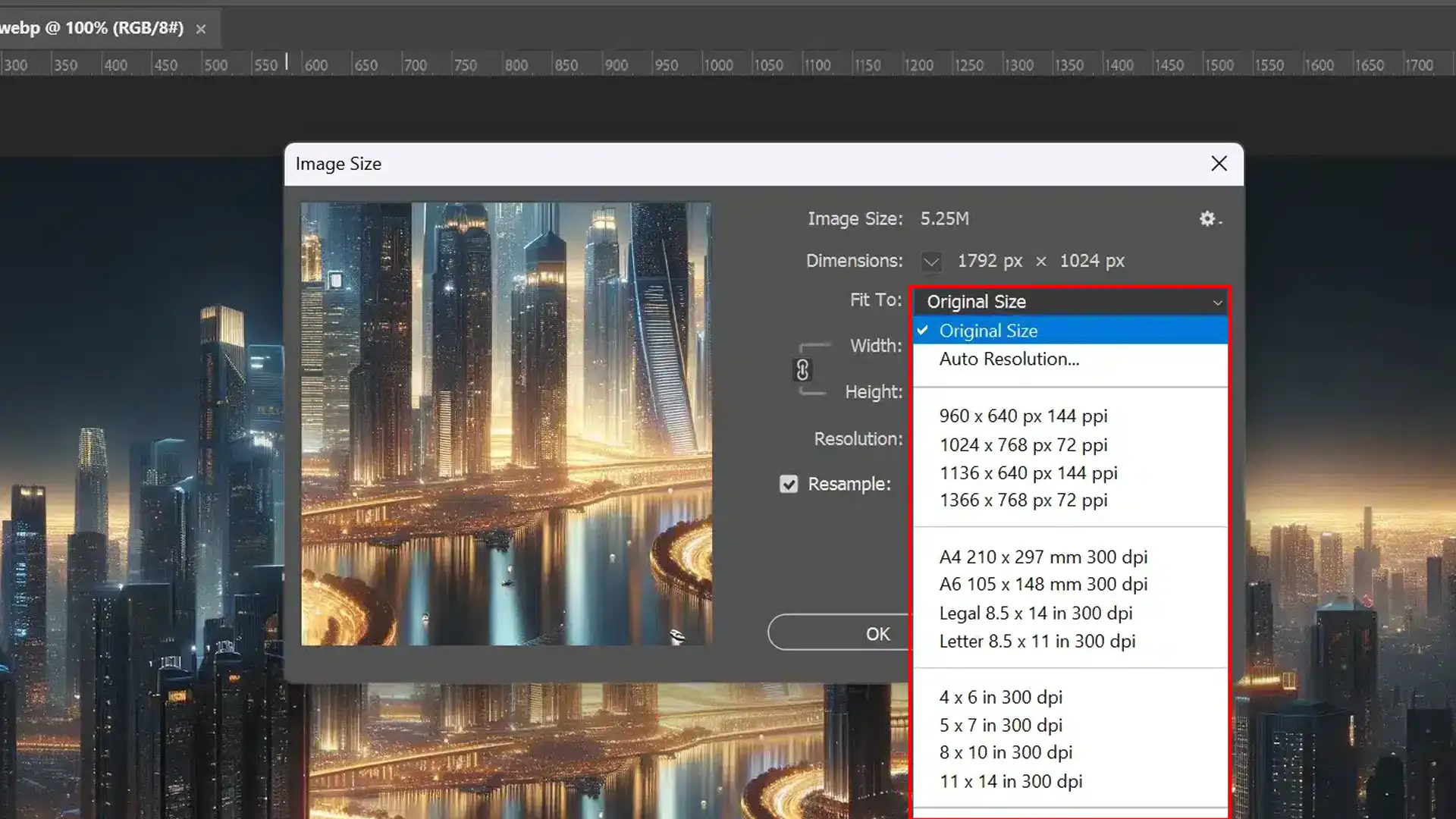 Screenshot of Adobe Photoshop interface showing the Image Size dialog box with cityscape background.
