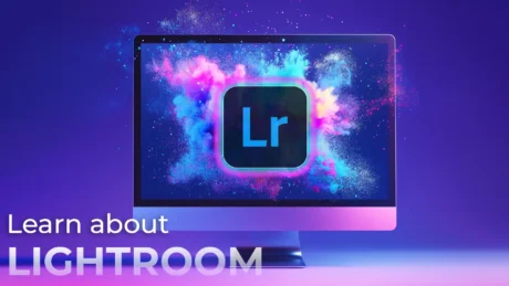 Computer screen displaying the Adobe Lightroom logo with colorful splashes of blue, pink, and purple powder on a vibrant background.