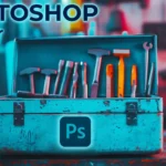 An open metal toolbox filled with various hand tools, with a Photoshop icon prominently displayed on the front, representing the diverse tools available in Adobe Photoshop's toolbar for editing and design.
