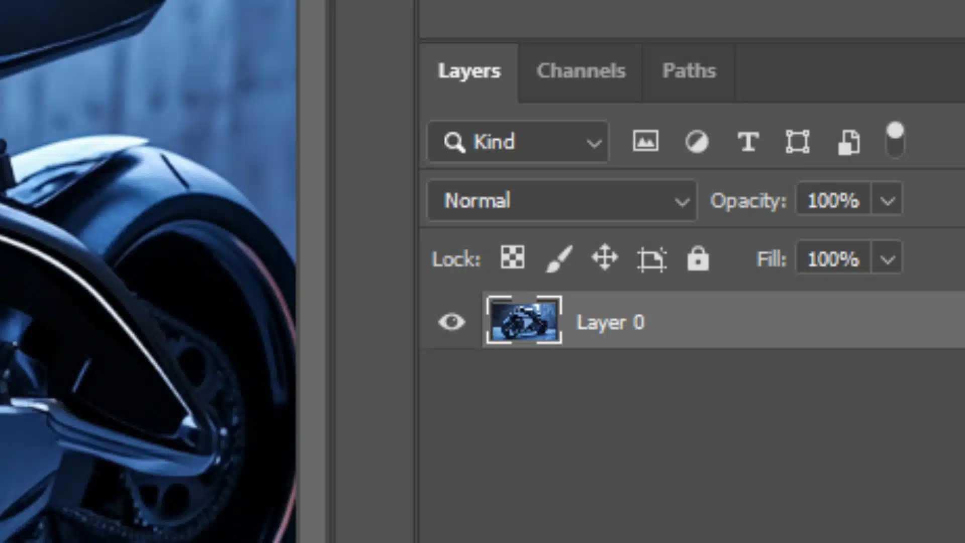 Photoshop Layers panel showing a selected single layer (Layer 0) of a motorcycle image.