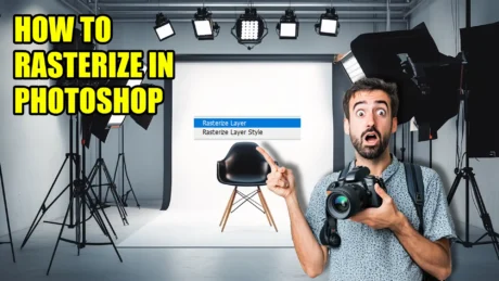 Photographer pointing to a Photoshop menu option showing "Rasterize Layer" in a studio setting, demonstrating how to rasterize in Photoshop.