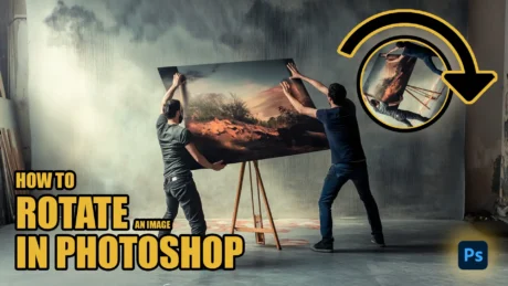 Two individuals rotating a large framed image on an easel, with bold text saying "How to Rotate an Image in Photoshop" and a circular arrow icon indicating rotation.