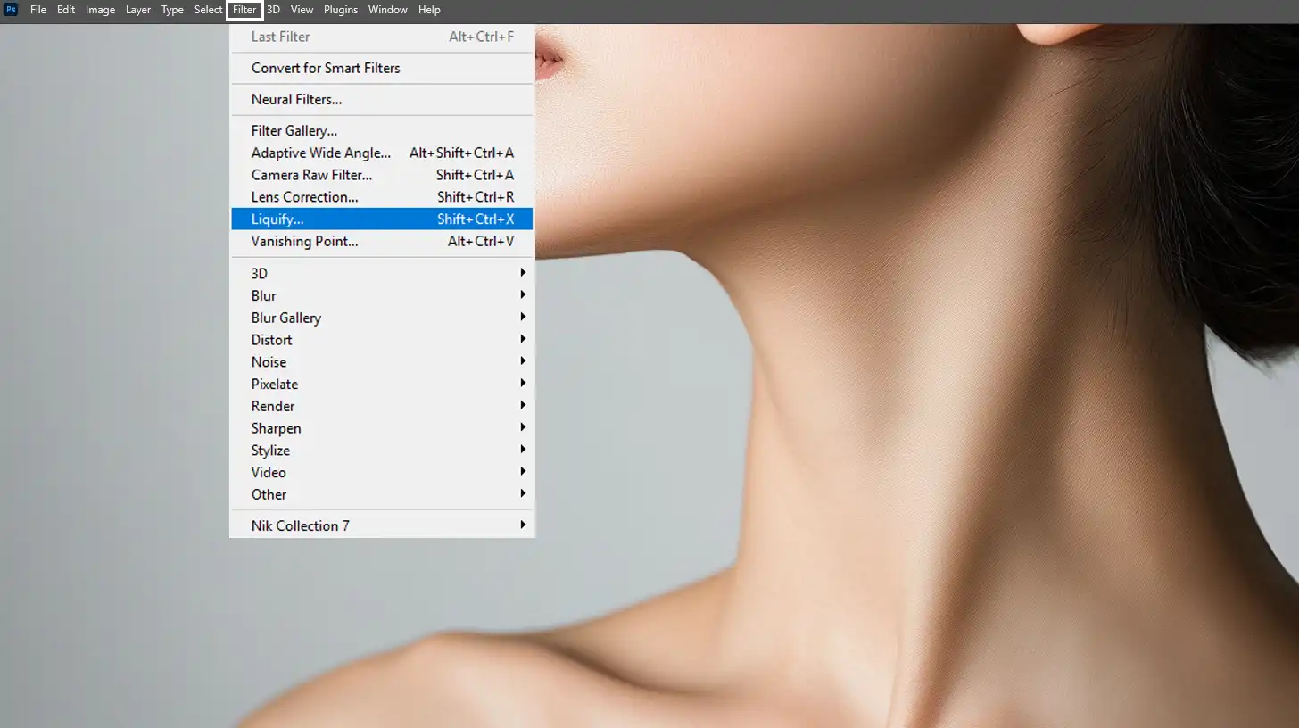 Locating the liquify tool in Photoshop for quick double chin removal