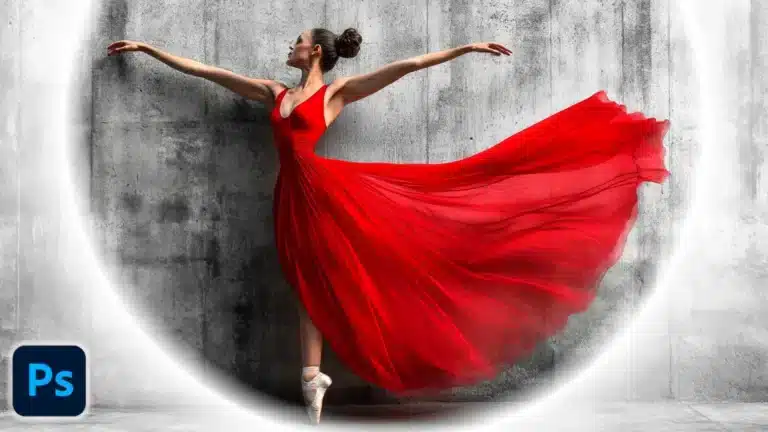 Ballerina in a flowing red dress performing in front of a textured wall with a white vignette effect added in Photoshop.