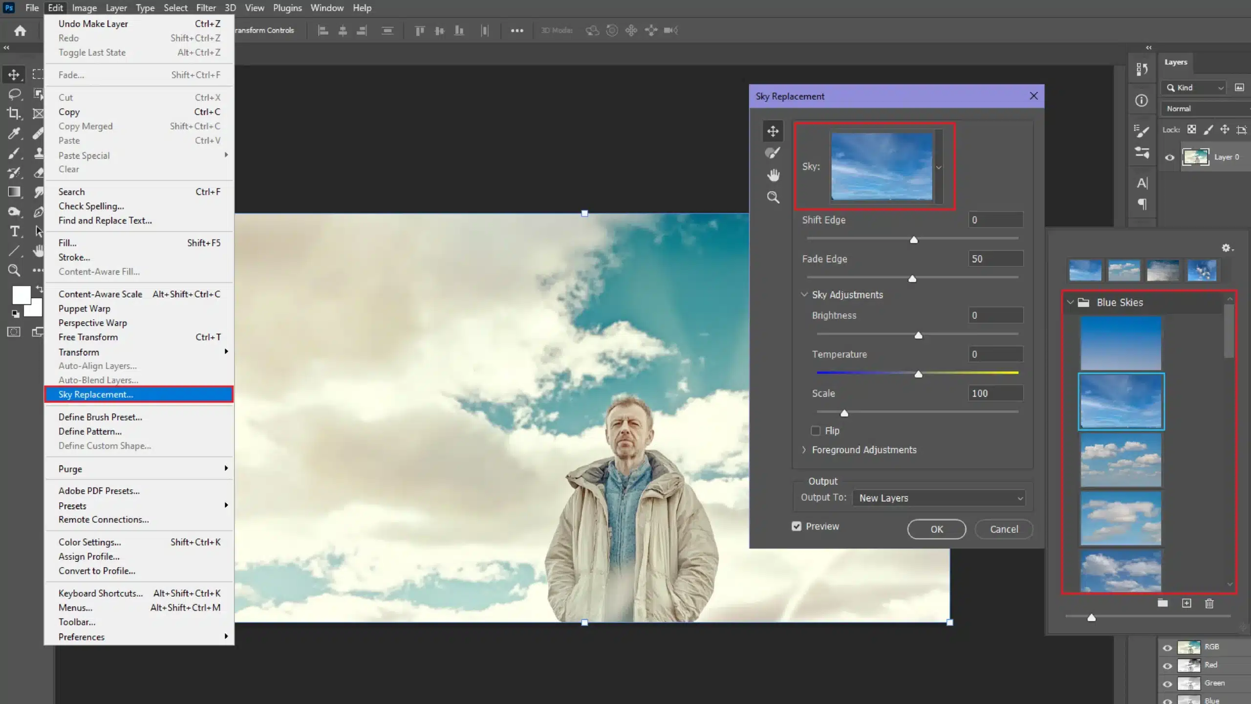 A screenshot of the Sky Replacement tool in Photoshop, showing the user interface with the sky options and settings on the right side. The image depicts a man standing in front of a cloudy sky, with the new sky replacement tool selected.