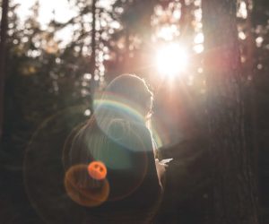 How to add lens flare in a photo of Girl in the woods