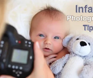 Close-up of an infant with a teddy bear during a photography session, representing baby shooting guidelines