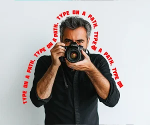 Man holding a camera with typography arched around his head, demonstrating the 'Typography around a shape' effect in Ps